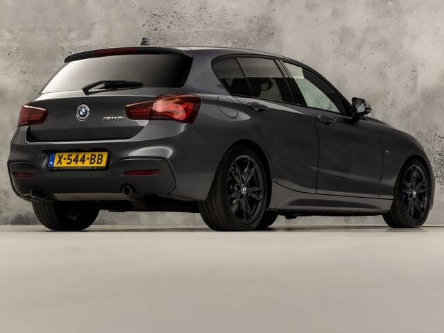 BMW 1-SERIE M140i M Sport High Executive 340Pk Automaat (6 CILINDER, M PAKKET, HARMAN/KARDON, ALCANTARA, CAMERA, SPORTSTOELEN, M SPORTREMMEN, NAVIGATIE, STOELVERWARMING, GETINT GLAS, NIEUWSTAAT)