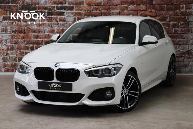 BMW 1-SERIE 118i Executive M Sport Pakket Automaat 5 deurs / Navigatiesysteem / 18 Inch / LED / Trekhaak / Extra Getint Glas / Stoelverwarming / LED / Climate Control / Hifi / Lichtpakket / Cruise Control / Bluetooth / Shadow Line