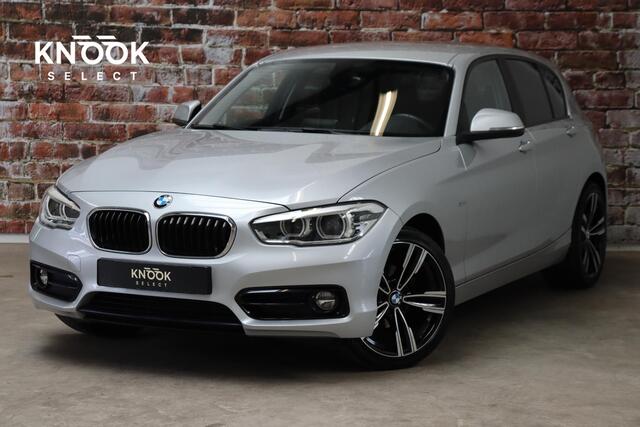 BMW 1-SERIE 116i Executive Sport Line 5 deurs / Navigatiesysteem / Trekhaak / LED / Sportstoelen / Parkeersensoren / Extra Getint Glas / Climate Control / Bluetooth / Cruise Control