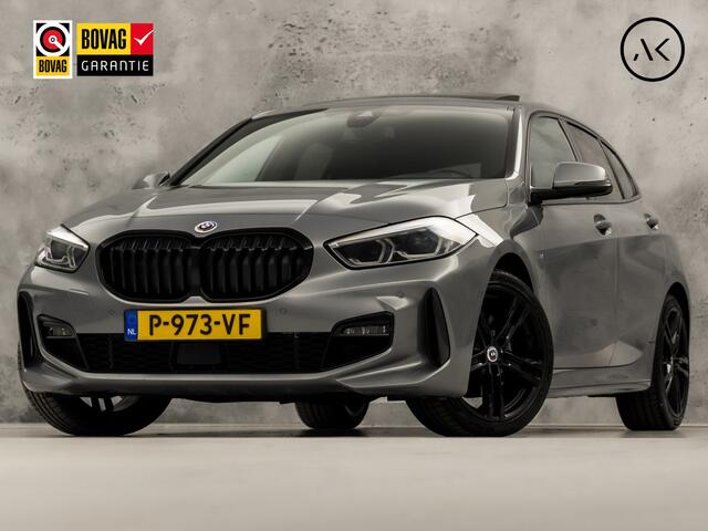 BMW 1-SERIE 118i M Sport Automaat (PANORAMADAK, M PAKKET, APPLE CARPLAY, GROOT NAVI, CAMERA, SPORTSTOELEN, SPOILER, GETINT GLAS, SFEERVERLICHTING, NIEUWSTAAT)