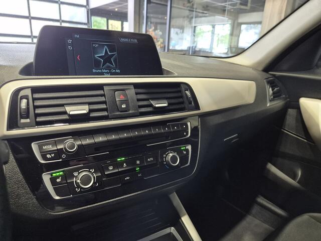BMW 1-SERIE 116i Executive Navi | Verw. stoelen| Sensoren | Trekhaak | Nette auto