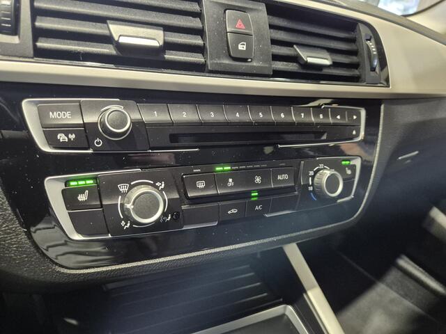 BMW 1-SERIE 116i Executive Navi | Verw. stoelen| Sensoren | Trekhaak | Nette auto