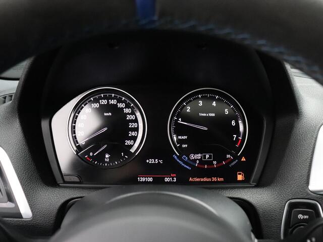 BMW 1-SERIE 118i High Executive | AUT. | M SPORT | LEDER | SCHUIFDAK | TREKHAAK | PDC | STOELVERW. | CRUISE |