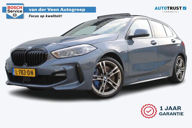 BMW 1-SERIE 118i High Executive M-sport | Incl. 12 maanden garantie | Cruise control | Kuipstoelen | Schuif/kantel dak | Climate control | Apple carplay | Navigatie | DAB radio | Harman/Kardon |