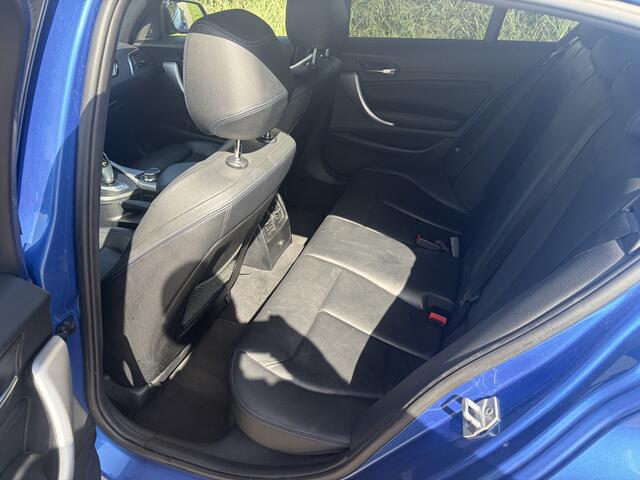 BMW 1-SERIE 118i Corporate Lease High Executive / M-PAKKET / AKRAPOVICH / LEER / AUTOMAAT / 159dkm! NAP!