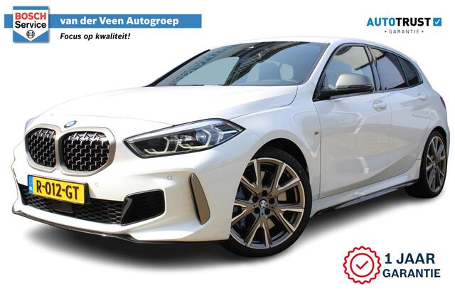 BMW 1-SERIE M135i xDrive High Executive | Incl. 12 maanden Garantie | Akrapovic uitlaatsysteem | Dealer onderhouden | Stoelverwarming | Cruise controle | Apple CarPlay/Android Auto | Keyless start | Schakelflippers | Climate controle | Navigatie | Parkeersensoren V+A | Half lederen bekleding |