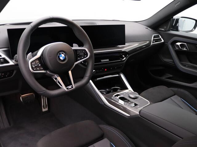 BMW 2-SERIE Coupé 220i High Executive | M Sportpakket Pro | Innovation Pack | Premium Pack | Stuurwielrand Verwarmd | Comfort Access | Schuifdak | Elektrisch Verstelbare Sportstoelen | Active Cruise Control | Harman Kardon | 19''