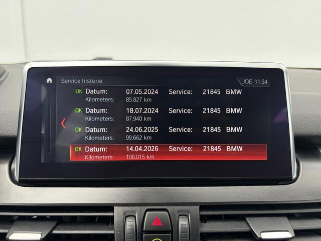 BMW 2-SERIE Active Tourer 218i High Executive / Trekhaak ( 1300 kg ) / Parking Pack / Panorama dak /