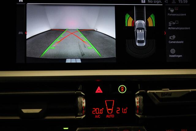 BMW 2-SERIE Coupé M240i xDrive High Executive | SCHUIFDAK | HARMAN KARDON | HEAD UP | DRAADLOZE LADER