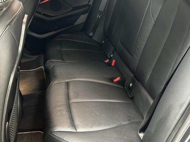 BMW 2-SERIE Gran Coupé 218i High Executive AFNEEMBARE TREKHAAK | LEDEREN BEKLEDING | NAVIGATIE | ACHTERUITRIJCAMERA