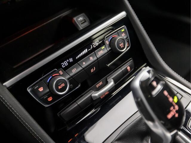 BMW 2-SERIE GRAN TOURER 218i Executive M Sport Automaat (GROOT NAVI, M PAKKET, HEAD-UP DISPLAY, LEDER, SFEERVERLICHTING, GETINT GLAS, SPORTSTOELEN, DIGITAL COCKPIT, CRUISE, NIEUWE APK, NIEUWSTAAT)