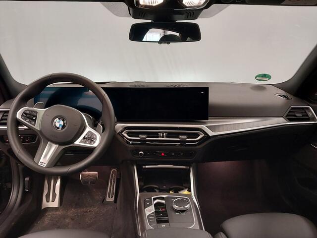 BMW 3-SERIE Touring M340i xDrive | Panorama | Harman Kardon | Trekhaak | | Driving Assistant Professional |