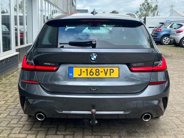 BMW 3-SERIE Touring 318i High Executive M sport pakket | Trekhaak | Voorstoelen verwarmd | Panoramadak |