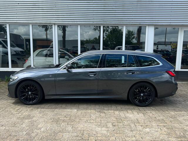BMW 3-SERIE Touring 318i High Executive M sport pakket | Trekhaak | Voorstoelen verwarmd | Panoramadak |
