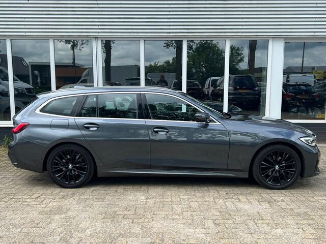 BMW 3-SERIE Touring 318i High Executive M sport pakket | Trekhaak | Voorstoelen verwarmd | Panoramadak |
