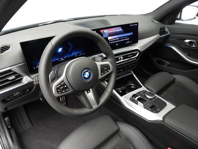 BMW 3-SERIE Touring 320e M-Sportpakket LED / Navigatie / Schuifdak / trekhaak / Keyles go / DAB / Hifi speakers / Alu 19 inch