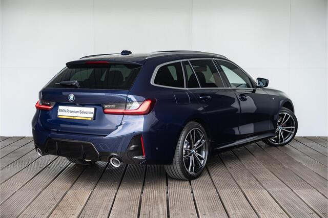 BMW 3-SERIE Touring 330e M Sportpakket / Panoramadak / Elektrische Trekhaak / Verwarmd Stuurwiel