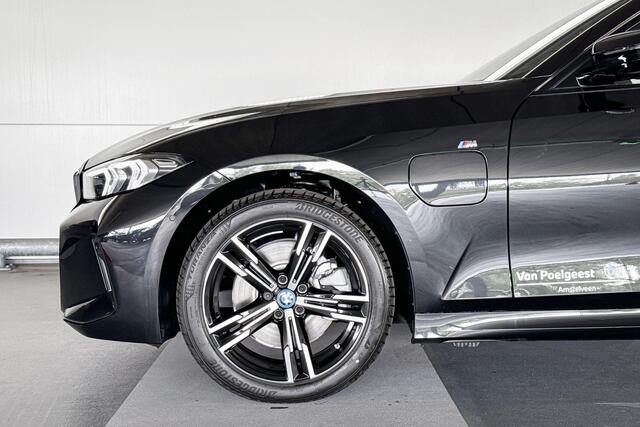 BMW 3-SERIE Sedan 320e | M Sportpakket | Trekhaak met elektrisch wegklapbare kogel