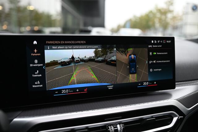 BMW 3-SERIE Touring 330e High Executive M Sport Automaat / Panoramadak / Trekhaak / Sportstoelen / Adaptieve LED / Adaptief M Onderstel / Parking Assistant Plus / Comfort Access
