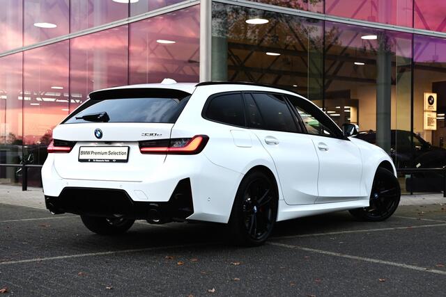 BMW 3-SERIE Touring 330e High Executive M Sport Automaat / Panoramadak / Trekhaak / Sportstoelen / Adaptieve LED / Adaptief M Onderstel / Comfort Access / Parking Assistant