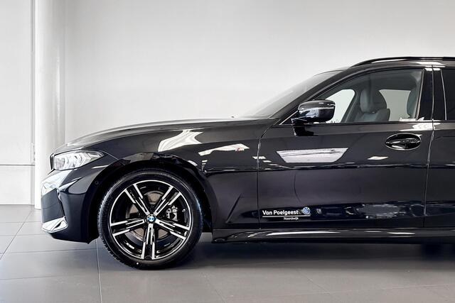 BMW 3-SERIE Touring 318i | M Sport | Glazen Panoramadak | Stoelverwarming | Achteruitrijcamera |