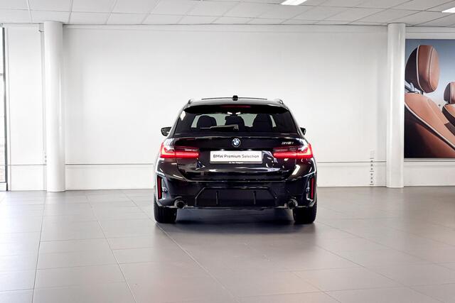 BMW 3-SERIE Touring 318i | M Sport | Glazen Panoramadak | Stoelverwarming | Achteruitrijcamera |