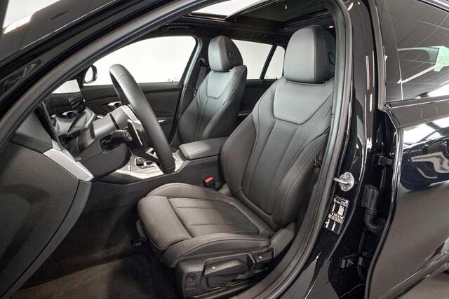 BMW 3-SERIE Touring 318i | M Sport | Glazen Panoramadak | Stoelverwarming | Achteruitrijcamera |