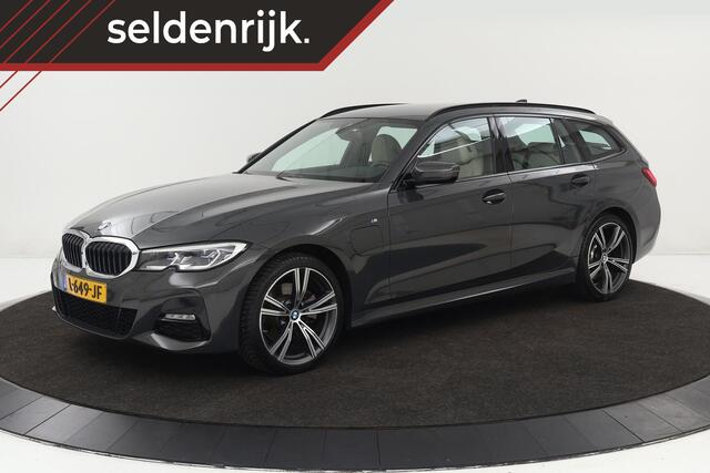BMW 3-SERIE 320e M Sport | Laserlight | Trekhaak | Stoelverwarming | Harman/Kardon Sound | Carplay | Adaptief demping | Leder | Navigatie
