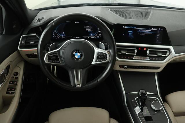 BMW 3-SERIE 320e M Sport | Laserlight | Trekhaak | Stoelverwarming | Harman/Kardon Sound | Carplay | Adaptief demping | Leder | Navigatie