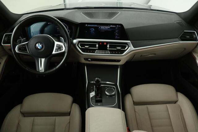 BMW 3-SERIE 320e M Sport | Laserlight | Trekhaak | Stoelverwarming | Harman/Kardon Sound | Carplay | Adaptief demping | Leder | Navigatie