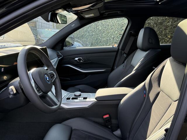 BMW 3-SERIE Sedan 320e | M-Sport | Schuif-/Kanteldak | Sportstoel. | Stoelverw. | HiFi