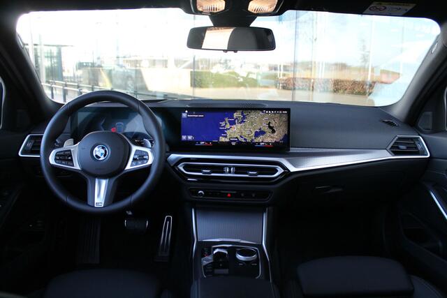 BMW 3-SERIE Touring 330e xDrive High Executive M Sport Automaat / Panoramadak / Sportstoelen / Stoelverwarming / Adaptieve LED / Live Cockpit Professional / Driving Assistant