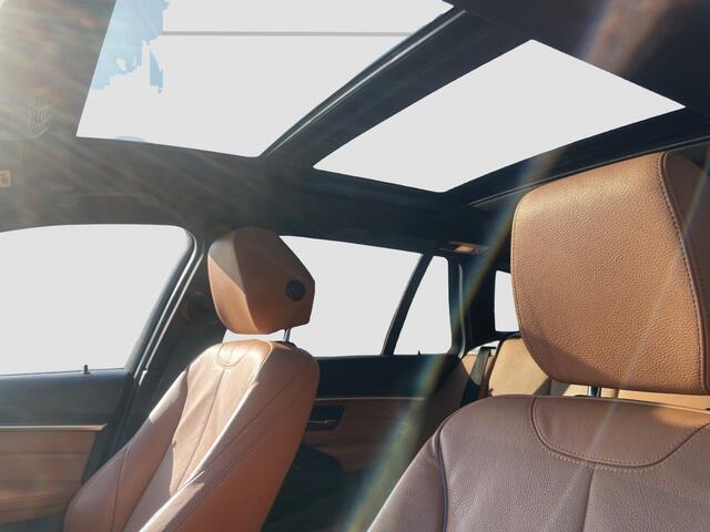 BMW 3-SERIE Touring 320i Luxuryline Adaptive cruise | Leder | Pano | Camera