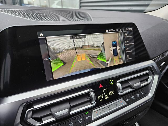 BMW 3-SERIE Touring 330e Luxury Line Plug In Hybrid 293pk PHEV | Panodak | Laser LED | Adaptive Onderstel | 360 Camera | Adaptive cruise | Head Up | Lederen Sportstoelen Memory | Sfeerverlichting | 18"L.M | Keyless |