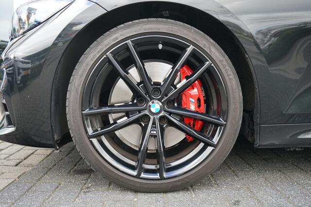 BMW 3-SERIE 320i High Executive Edition | Head-up display | Schuif/Kantel dak |