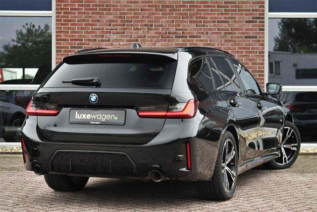 BMW 3-SERIE Touring 320e M-Sport ACC HUD Sfeer Camera HiFi Stuurverw