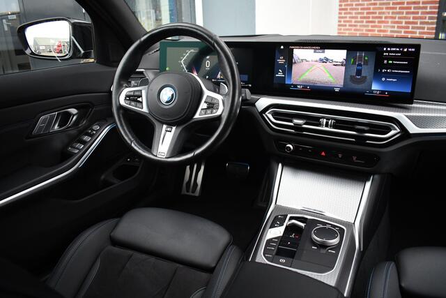 BMW 3-SERIE Touring 320e M-Sport ACC HUD Sfeer Camera HiFi Stuurverw