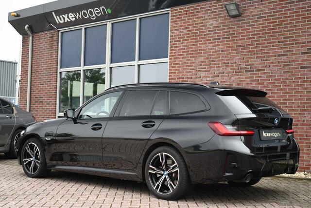 BMW 3-SERIE Touring 320e M-Sport ACC HUD Sfeer Camera HiFi Stuurverw