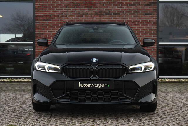 BMW 3-SERIE Touring 320e M-Sport ACC HUD Sfeer Camera HiFi Stuurverw