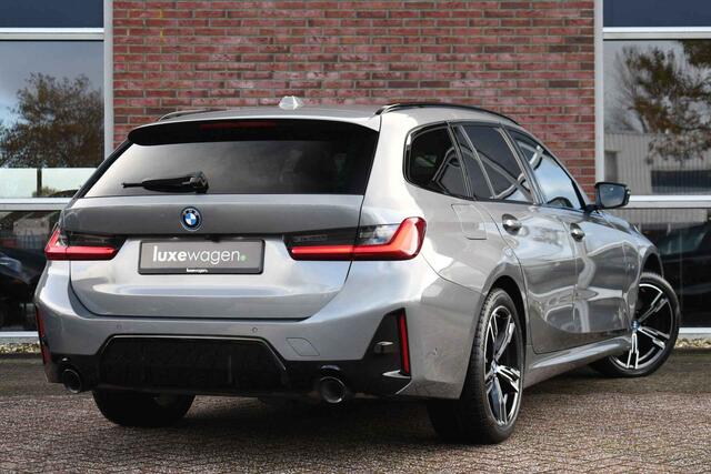 BMW 3-SERIE Touring 320e M-Sport ACC HUD Sfeer Camera HiFi Stuurverw