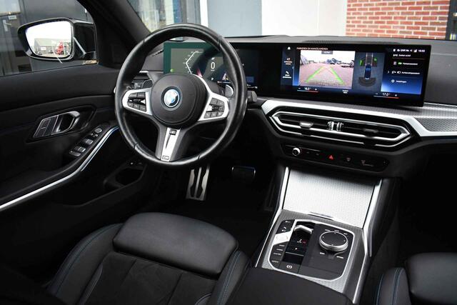 BMW 3-SERIE Touring 320e M-Sport ACC HUD Sfeer Camera HiFi Stuurverw