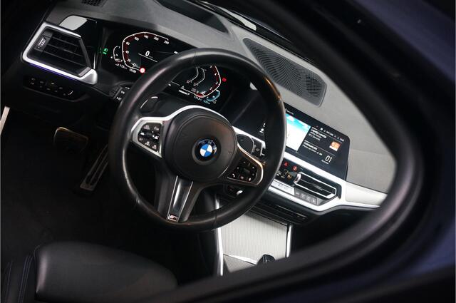 BMW 3-SERIE Touring 330e xDrive High Executive M-Sport | M Performance | Panoramadak | Harman Kardon | 360° Camera | Assisted Driving | Head Up Display | Stoelverwarming | Apple Carplay | Navigatie | Adaptive Cruise Control | Ambiance Verlichting