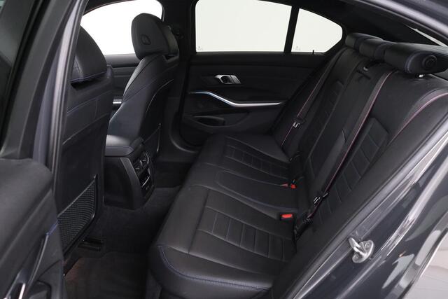 BMW 3-SERIE 320e M Sport | Schuifdak | Laserlight | Leder | Stoelverwarming | Carplay | Sfeerverlichting | Camera | Live Cockpit | Sportstoelen | Navigatie | Park Assist | Dodehoek detectie