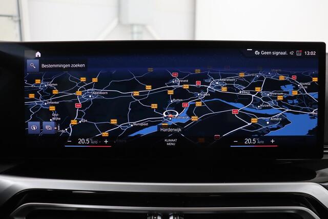 BMW 3-SERIE 320e Business | Stoelverwarming | Adaptive cruise | Trekhaak | Harman/Kardon | Carplay | Camera | Half leder | Sportstoelen