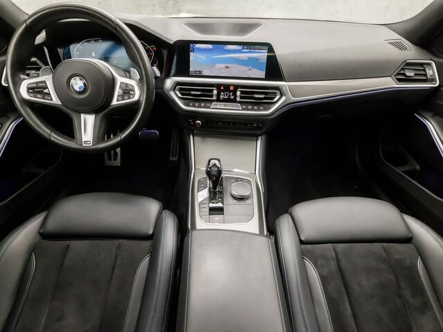 BMW 3-SERIE 320i High Executive M Sport 184Pk Automaat (SCHUIFDAK, M PAKKET, APPLE CARPLAY, LEDER/ALCANTARA, STOELVERWARMING, SPORTSTOELEN, CAMERA, SFEERVERLICHTING, ADAPTIVE CRUISE, NIEUWSTAAT)