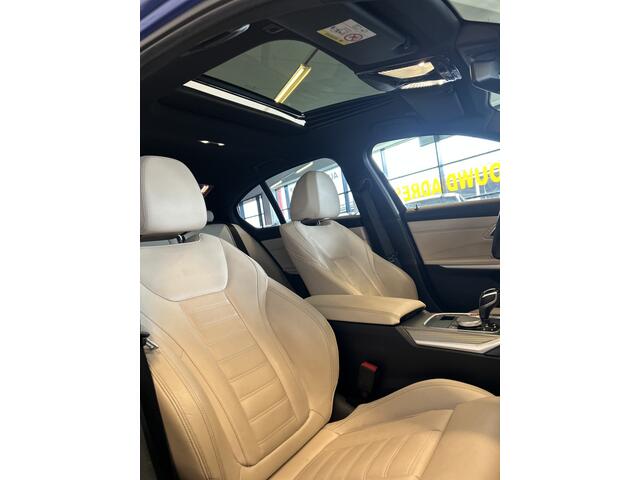 BMW 3-SERIE 330i High Executive M Sport | Panoramadak | Harman/Kardon | Adaptieve cruise control | Laser LED | Lane assist | Achteruitrijcamera | Adaptief onderstel | Dodehoeksdetectie | Head up display | Lederen bekleding | Keyless | Stoelverwarming V+A