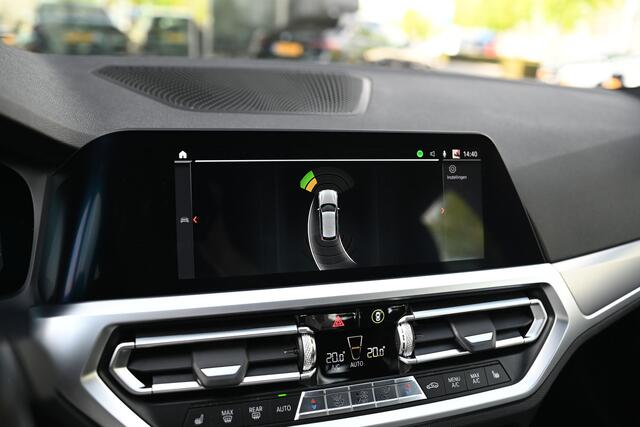 BMW 3-SERIE Touring 330i High Executive M Sport Automaat / Sportstoelen / Active Cruise Control / M Sportonderstel / Live Cockpit Professional / Stoelverwarming