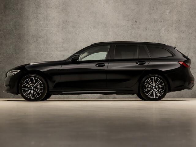 BMW 3-SERIE Touring 330e xDrive High Executive 293Pk Automaat (APPLE CARPLAY, DEALER ONDERHOUDEN, GROOT NAVI, CAMERA, STOELVERWARMING, LEDEREN SPORTSTOELEN, ELEK ACHTERKLEP, GETINT GLAS, VIRTUAL COCKPIT, LANE ASSIST, NIEUWSTAAT)