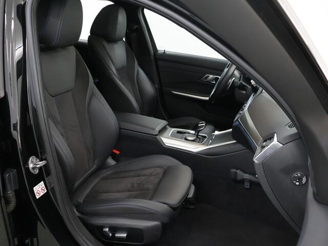 BMW 3-SERIE Touring 330e High Executive | M-Sport | LED | Panoramadak | ShadowLine | Sportstoelen | Standkachel | HUD | Ele. verstelbare stoelen + Geheugen | Camera | Apple CarPlay/Android Auto | Stoelverwarming | Adaptief Onderstel |