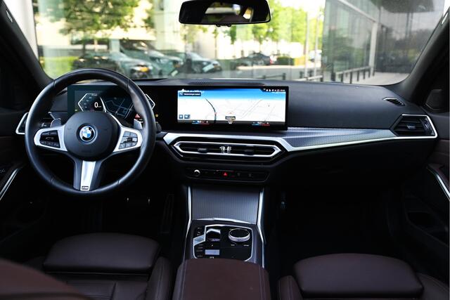 BMW 3-SERIE Touring 320e High Executive M Sport Automaat / Panoramadak / Sportstoelen / Adaptieve LED / Comfort Access / Parking Assistant / Live Cockpit Professional